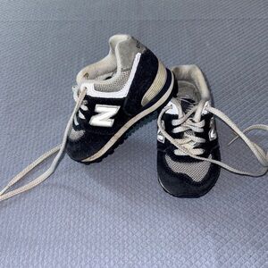 New Balance Kids Black and White Lace-Up Sneakers
